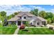 Charming two-story home with stone accents, lush lawn, and well-maintained landscaping at 16731 George Gang Blvd, Westfield, IN 46062