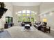 Bright living room featuring large windows, comfortable seating, and great views of the outdoors at 16731 George Gang Blvd, Westfield, IN 46062