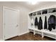A practical mud room featuring a bench, cubbies, and hooks, providing a convenient space for organizing coats and shoes at 16731 George Gang Blvd, Westfield, IN 46062