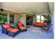 Covered patio features comfortable seating, perfect for outdoor relaxation and entertaining guests in style at 16731 George Gang Blvd, Westfield, IN 46062