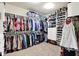 A well-organized walk-in closet featuring shelves, hanging rods, and ample storage space for clothes and accessories at 16731 George Gang Blvd, Westfield, IN 46062