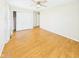 Spacious bedroom featuring hardwood floors, a closet, and a ceiling fan at 1813 Kingsley Dr, Anderson, IN 46011