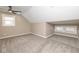 Bright bedroom with plush carpets, modern ceiling fan, and natural light through multiple windows at 1921 N Dexter St, Indianapolis, IN 46202