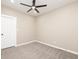 An empty bedroom with neutral walls, carpet, and a ceiling fan at 1921 N Dexter St, Indianapolis, IN 46202