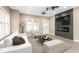 Comfortable living room featuring an electric fireplace, ceiling fan, and neutral tones at 1921 N Dexter St, Indianapolis, IN 46202