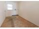 A bedroom with carpet flooring and a closet and one window in a neutral color scheme at 1932 Central Ave, Columbus, IN 47201