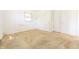 A bedroom with carpet flooring and a closet with neutral tones for a cozy feel at 1932 Central Ave, Columbus, IN 47201