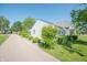 Exterior view with manicured bushes alongside of the house at 1932 Central Ave, Columbus, IN 47201