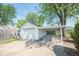 View of detached one car garage with connected carport at 1932 Central Ave, Columbus, IN 47201