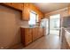 Kitchen featuring classic cabinetry, counter space, and convenient appliances at 1932 Central Ave, Columbus, IN 47201