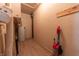 A utility room with wood floors, water heater, and a vacuum cleaner at 1932 Central Ave, Columbus, IN 47201