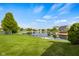 Backyard with a lake and well manicured lawn at 1969 Westminster Pl, Columbus, IN 47201