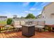Relax on this beautiful backyard deck with outdoor seating and a cozy fire table at 1969 Westminster Pl, Columbus, IN 47201