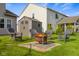 Backyard with a fire pit, shed and chairs at 1969 Westminster Pl, Columbus, IN 47201