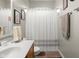 Bathroom with a white shower curtain at 1969 Westminster Pl, Columbus, IN 47201