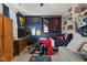 Cozy bedroom with sports decor, large bed, and carpet flooring at 1969 Westminster Pl, Columbus, IN 47201