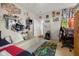 Bright bedroom featuring unique decor, carpet floors, and a comfortable lounge area at 1969 Westminster Pl, Columbus, IN 47201