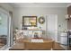 Well-lit dining area with slider to the outdoors at 1969 Westminster Pl, Columbus, IN 47201