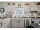 Well-organized kitchen area with modern appliances and granite countertops at 1969 Westminster Pl, Columbus, IN 47201
