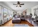 Spacious living room with large windows and a generous sectional sofa at 1969 Westminster Pl, Columbus, IN 47201