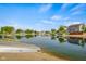 This backyard features lake access in a beautiful neighborhood with gorgeous scenery at 1969 Westminster Pl, Columbus, IN 47201