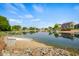 The home has a beautiful pond with a fountain and beach access in the backyard at 1969 Westminster Pl, Columbus, IN 47201
