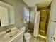 Bathroom featuring a modern sink, shower, and tile at 2324 E 36Th St, Indianapolis, IN 46218