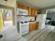 The kitchen has stainless steel appliances and a window for natural light at 2324 E 36Th St, Indianapolis, IN 46218