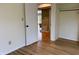 Cozy bedroom featuring hardwood floors and an open doorway, creating an inviting and airy space at 2829 Somerset Bay, Indianapolis, IN 46240