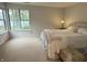 Bedroom with a large window overlooking the lake at 2829 Somerset Bay, Indianapolis, IN 46240
