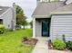 Charming two-story residence featuring serene water view, inviting curb appeal, and meticulously maintained front yard at 2829 Somerset Bay, Indianapolis, IN 46240