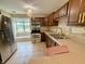 Updated kitchen boasts stainless steel appliances, tile floors, and ample counter space at 2829 Somerset Bay, Indianapolis, IN 46240