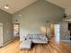 Open floorplan living room with hardwood floors, vaulted ceiling and adjacent room views at 2829 Somerset Bay, Indianapolis, IN 46240
