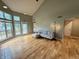 Spacious living room featuring hardwood floors, fireplace, vaulted ceilings, and lots of natural light at 2829 Somerset Bay, Indianapolis, IN 46240