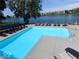 Community pool with many lounge chairs overlooking lake for residents enjoyment at 2829 Somerset Bay, Indianapolis, IN 46240