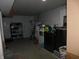 Unfinished basement with laundry area and storage shelving at 2867 S Oakland Dr, Shelbyville, IN 46176