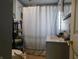 Functional bathroom featuring a shower with curtain and sink at 2867 S Oakland Dr, Shelbyville, IN 46176