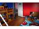 Vibrant bedroom with built-in shelving and colorful decor at 2867 S Oakland Dr, Shelbyville, IN 46176