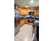 Well-lit kitchen featuring stainless steel appliances, countertops, and tile flooring at 2867 S Oakland Dr, Shelbyville, IN 46176