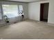 Cozy living room with carpet and natural light at 2927 E 8Th St, Anderson, IN 46012