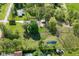 Aerial view illustrating property boundaries, pond, outbuildings and tree line at 296 W Greencastle Rd, Mooresville, IN 46158