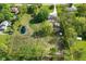 Bird's-eye view highlighting property lines, pond, outbuildings and tree coverage at 296 W Greencastle Rd, Mooresville, IN 46158