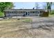 Exterior of home showing a large backyard with a grill and ample space for outdoor activities at 296 W Greencastle Rd, Mooresville, IN 46158