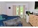 Cozy bedroom featuring a double door entry to outdoor living space and workspace at 296 W Greencastle Rd, Mooresville, IN 46158