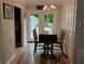 Cozy dining room with wood floors, and backyard access at 296 W Greencastle Rd, Mooresville, IN 46158