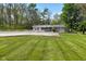 Charming single-story home with a blue front door and well-manicured lawn at 296 W Greencastle Rd, Mooresville, IN 46158