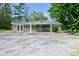 Charming single-story home with a bright blue front door and covered porch at 296 W Greencastle Rd, Mooresville, IN 46158