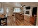 Bright living room featuring a fireplace, large windows, and stylish decor at 296 W Greencastle Rd, Mooresville, IN 46158