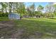 Expansive backyard with a shed and chicken coop, offering ample space for outdoor activities at 296 W Greencastle Rd, Mooresville, IN 46158