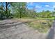 Expansive yard with gravel and grass areas, offering potential for various outdoor activities and landscaping at 296 W Greencastle Rd, Mooresville, IN 46158